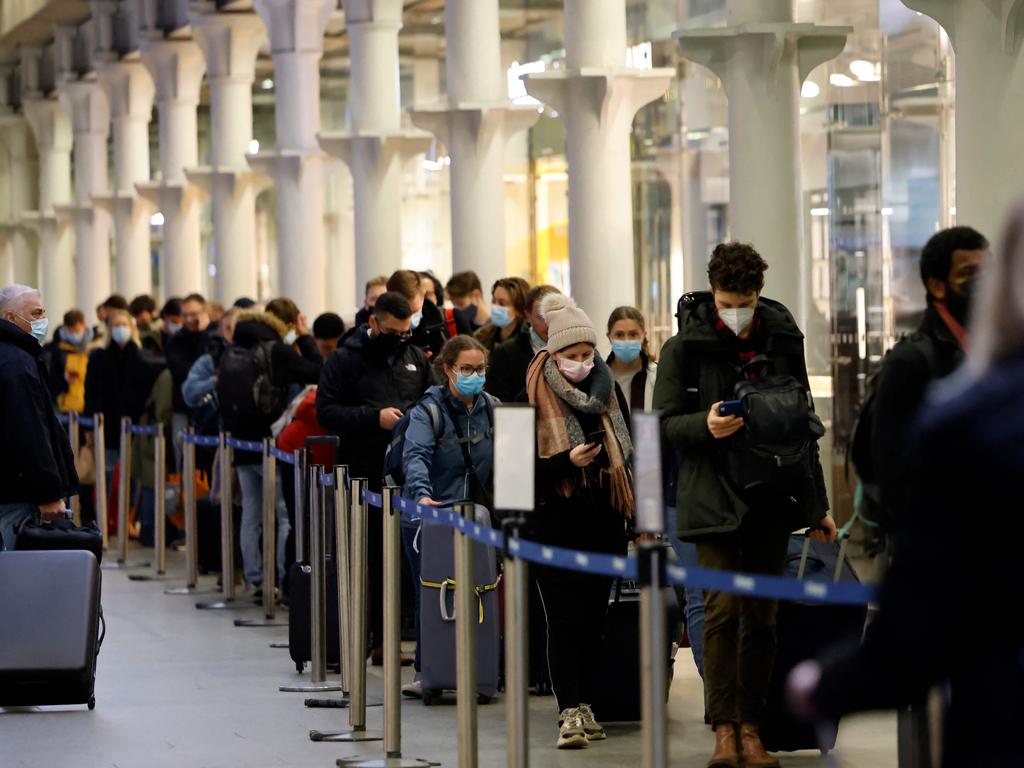 Passengers queue to board Eurostar trains in London on the final day before new restrictions are imposed on travellers to combat the spread of the Omicron variant. Picture: AFP