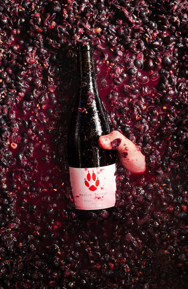 Winemaker Jordi Renard brandishes a bottle from grapes during a bottling session in Villeneuve, Switzerland. Picture: Nicolas Mancosu/Pink Lady® Food Photographer of the Year