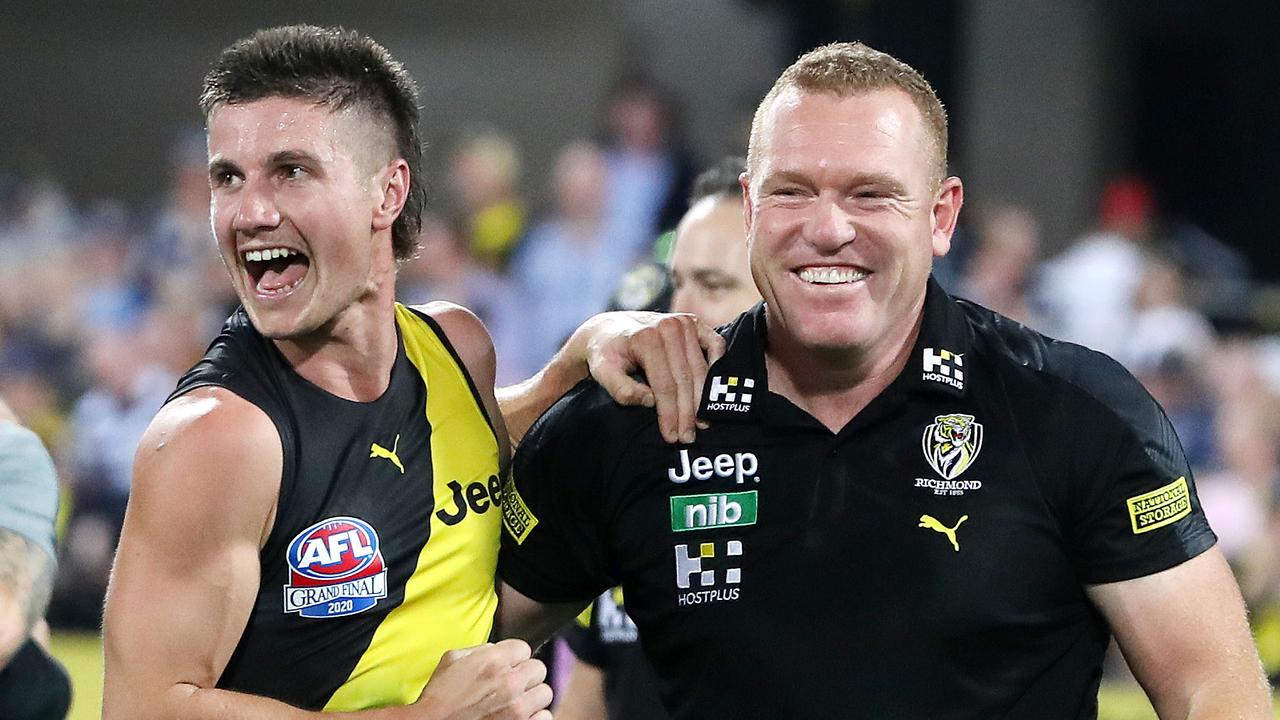 Justin Leppitsch celebrates with Liam Baker after the Tigers won this year’s Grand Final against Geelong at the Gabba. Picture: Sarah Reed