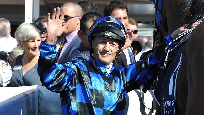 Jockey Damian Browne returns to scale after winning his third Group 1 on Buffering. Picture: Graeme Collopy