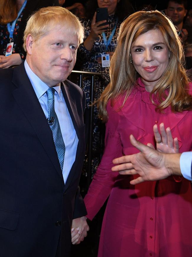 Britain's Prime Minister Boris Johnson and his partner Carrie Symonds. Picture: AFP