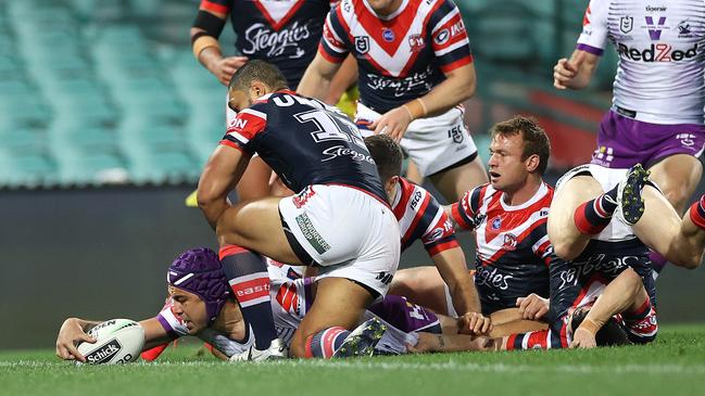 Melbourne’s Jahrome Hughes scores a try against the Roosters. Picture: Phil Hillyard