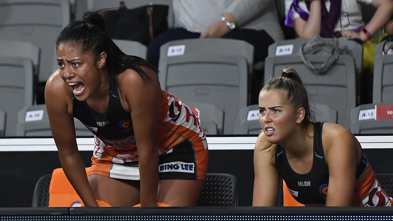 BRISBANE, AUSTRALIA - SEPTEMBER 26: Giants players Kristina Manu'a and Matisse Letherbarrow react during the round 14 Super Netball match between the NSW Swifts and the Giants at Nissan Arena on September 26, 2020 in Brisbane, Australia. (Photo by Albert Perez/Getty Images)