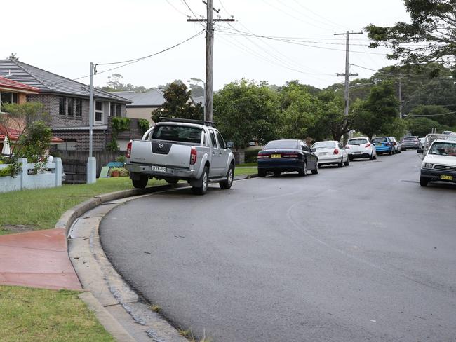 Street where houses will be acquired for new harbour tunnel. talk to residents display pictures