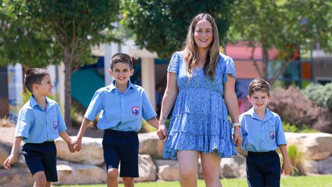 Satisfied mum Olivia Sindoni, with her children Christiano, Adriano and Juliano at Oran Park Anglican College. Picture: Justin Lloyd.