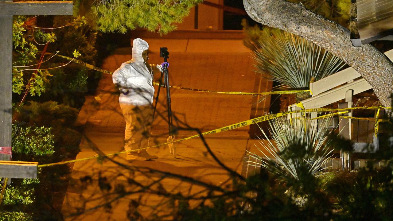 A member of a forensics team works the scene in Thousand Oaks. Picture: AP