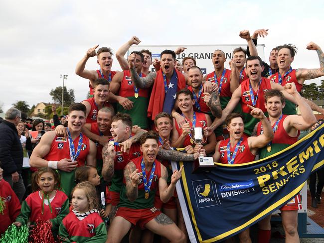 Pines celebrate with the winning trophy after MPNFL Division 1 grand final. Picture: Andy Brownbill.