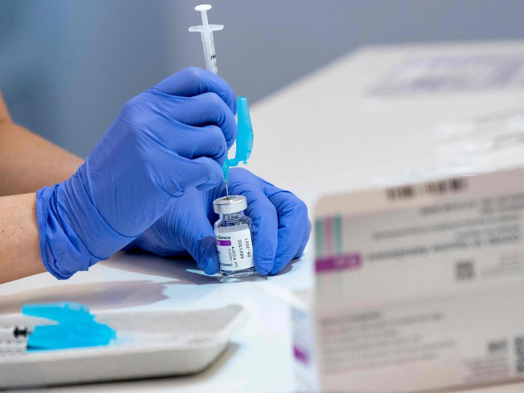 A health worker preparing syringes with the AstraZeneca vaccine. Picture: Johan Nilsson/AFP