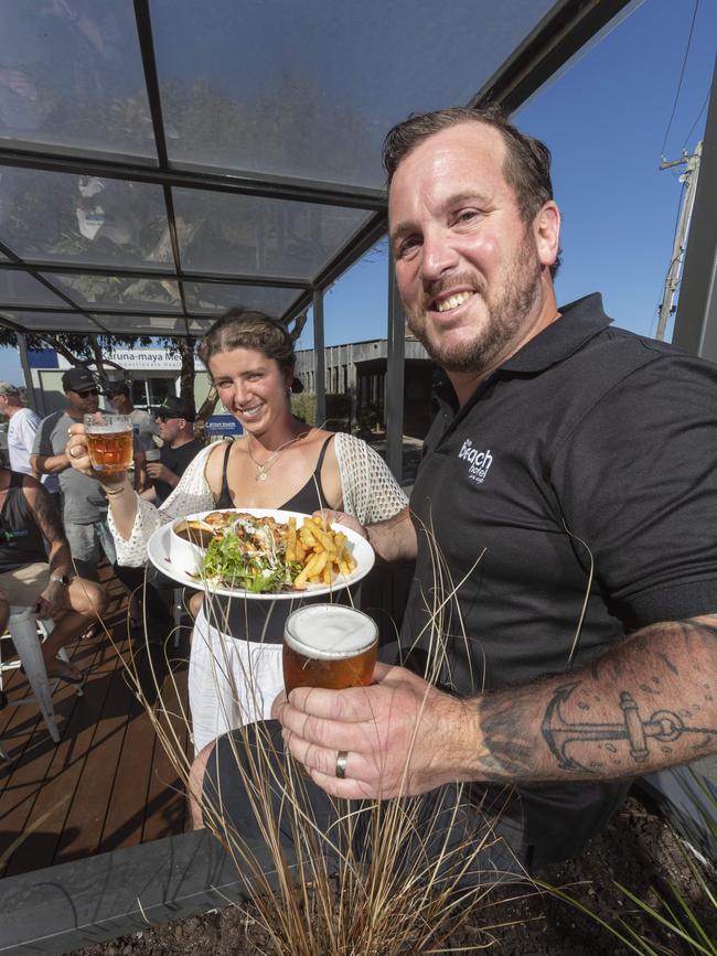 From Parking to Parmis! Parklet suppoer supporter Frankie Kaye of Swell Cafe and Beach Hotel supervisor Paul Wilkins. Surf Coast Shire Council’s Parklet Pilot Program has begun at the Beach Hotel in Jan Juc. Picture: Alan Barber