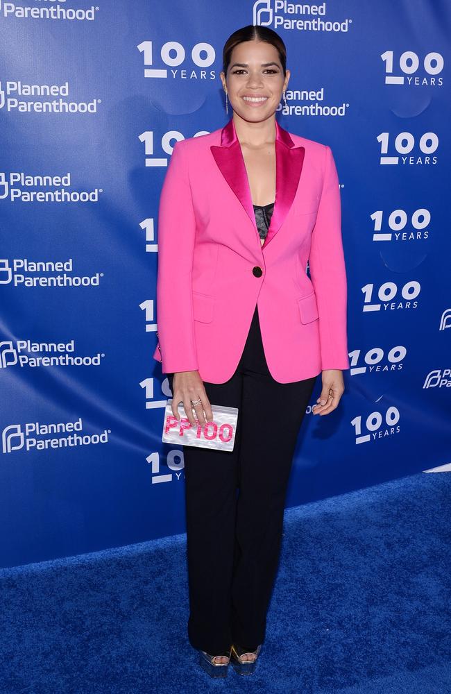 Actress America Ferrera wore a Kate Spade hot pink blazer and black pants to an event in NYC in 2017. Picture: Andrew Toth/Getty Images