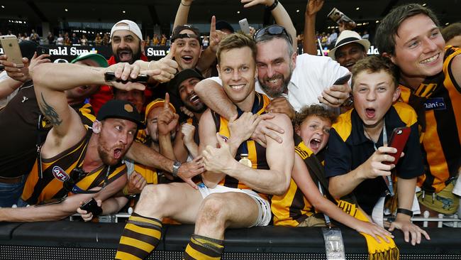 Sam Mitchell enjoys the 2015 premiership victory with Hawthorn fans. Picture: Michael Klein