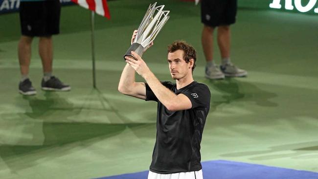 Andy Murray holds up his the Shanghai Masters trophy after defeating Roberto Bautista Agut of Spain. Picture: Chen di