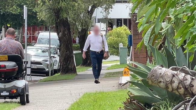 An officer accused of leaking a screenshot of an internal QPS policy, which was slammed as "dangerous" by the Premier David Crisafulli, arrives at Coolangatta station to be formally interview.