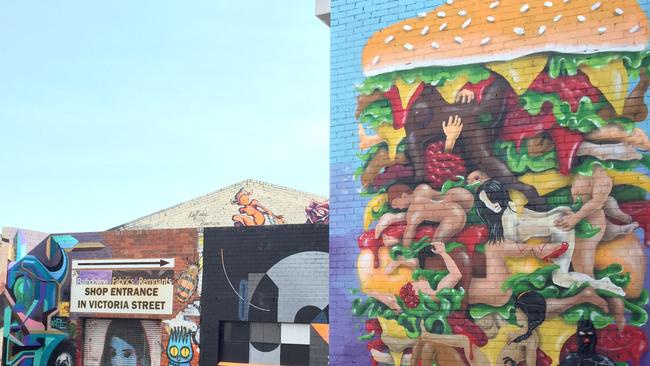 Street art on exterior walls of fabric warehouse owned by Dean Sunshine in Brunswick, Melbourne.