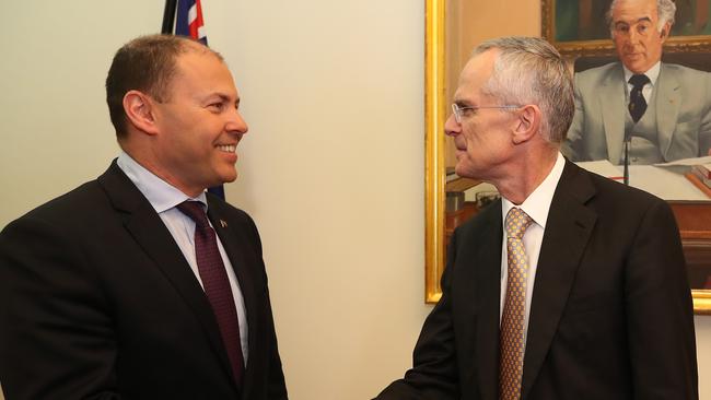 Treasurer Josh Frydenberg with former ACCC Chairman Rod Sims at Parliament House in Canberra.