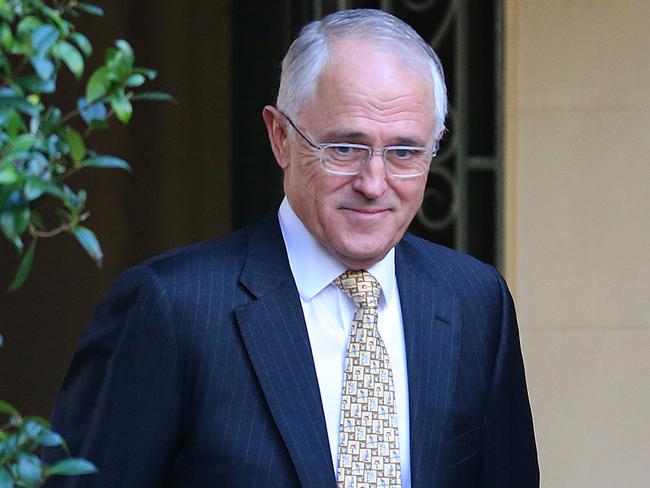 Malcolm Turnbull looks pleased as he leaves his house earlier today. Picture: David Moir