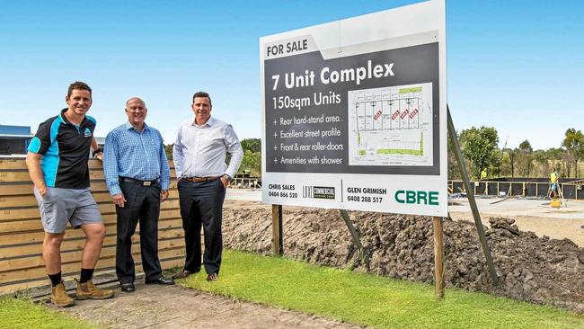 GOING UP: First Choice Constructions managing director Nick Lancaster, left, with Glen Grimish and Chris Sales at 17-19 Claude Boyd Parade, Bells Creek. Picture: Contributed