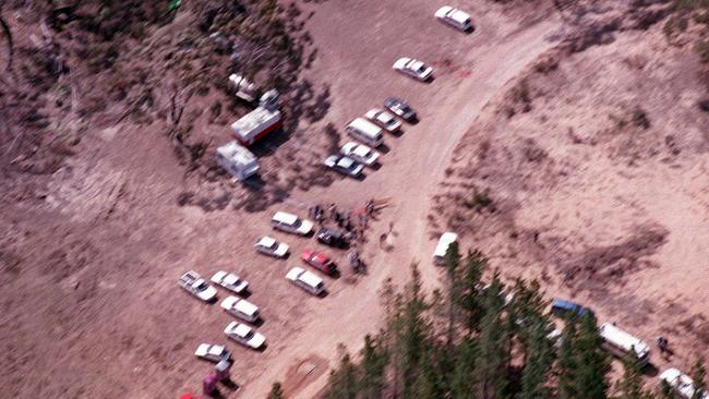 Police search Belanglo State Forest National Park backpacker murder scene in November 1993.