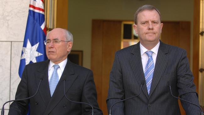 John Howard and Peter Costello holding a joint press conference at Parliament House.