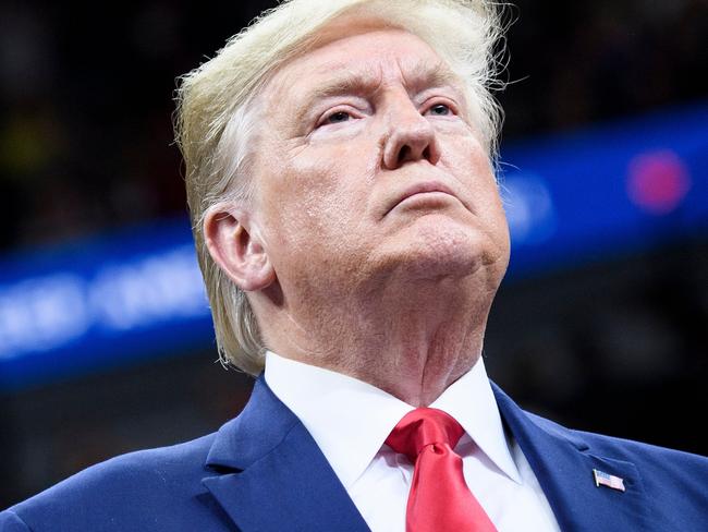 US President Donald Trump speaks during a "Keep America Great" rally at the Target Center in Minneapolis, Minnesota on October 10, 2019. (Photo by Brendan Smialowski / AFP)