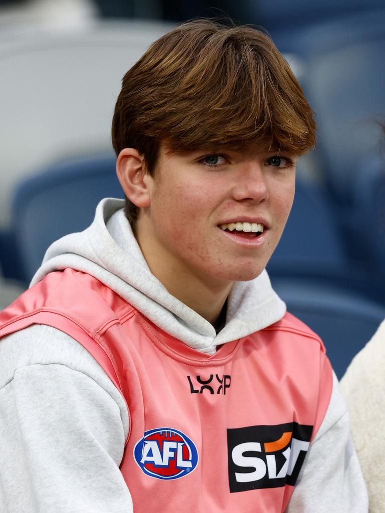 A Suns fan in the pink guernsey at GMHBA Stadium. (Photo by Michael Willson/AFL Photos via Getty Images)