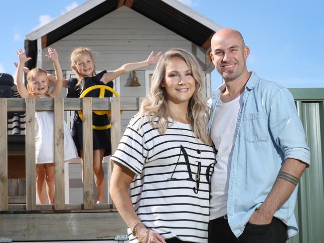 Mother-of-two Lisa Ware, 37, and her husband Michael, 38, with daughters Isabelle, 5 and Emelia, 3. Picture: David Crosling