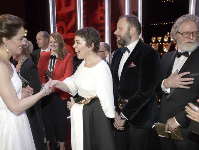 Catherine, Duchess of Cambridge meets Olivia Colman, and director Yorgas Lanthimos, 2nd right, and writer Tony McNamara, right, at the EE British Academy Film Awards. Picture: Getty