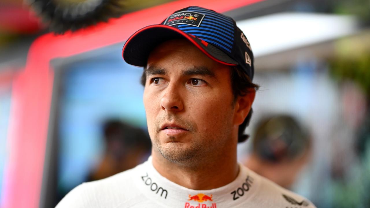 BAKU, AZERBAIJAN - SEPTEMBER 14: Sergio Perez of Mexico and Oracle Red Bull Racing looks on in the garage during qualifying ahead of the F1 Grand Prix of Azerbaijan at Baku City Circuit on September 14, 2024 in Baku, Azerbaijan. (Photo by Dan Mullan/Getty Images)