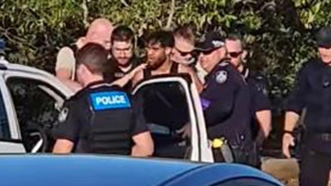 Ryan Sampson, 33, is arrested by Queensland police near Fig Tree Creek in Yeppoon on November 24, 2024. Newcastle detectives had wished to speak with Sampson over the alleged murder of James Callahan at Hamilton on November 17, 2024.