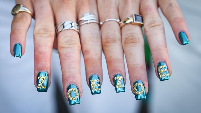 Some of Zoe Daniels’ supporters have gone all out for election day. Picture: NewsWire/ Nadir Kinani