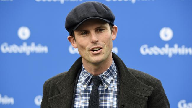Godolphin trainer James Cummings speaks to the media at Flemington. Picture: Andrew Henshaw
