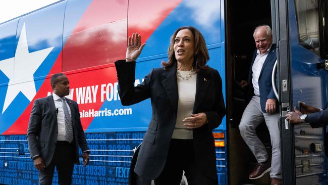 Democratic presidential candidate US Vice-President Kamala Harris and her running mate, Minnesota Governor Tim Walz, disembark from their campaign bus in Savannah, Georgia, on August 28, 2024. Picture: AFP