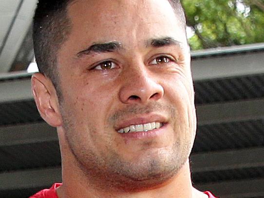 Jarryd Hayne welcomed home by his brothers at Sydney Airport after returning from his stint at the San Francisco 49ers .Picture Gregg Porteous