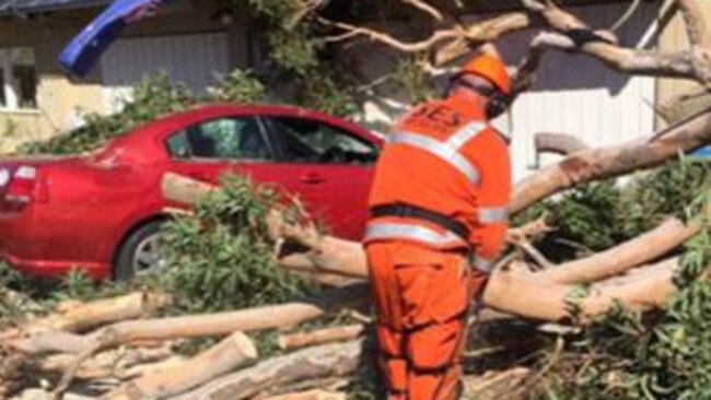 A Hastings SES member works to free a trapped car. New volunteers will get training in a range of skills, including chainsaws.