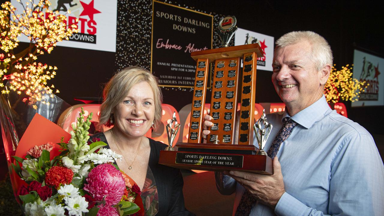 Kathy and Darren Stewart with the Sports Darling Downs Senior Sports Star of the Year trophy awarded to their daughter Tatum Stewart at the presentation dinner at Rumours International, Saturday, February 1, 2025. Picture: Kevin Farmer