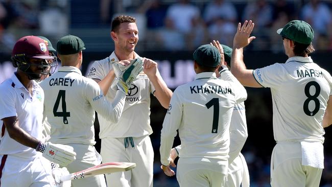 Australia celebrates the wicket of Kraigg Brathwaite. (Photo by Bradley Kanaris/Getty Images)