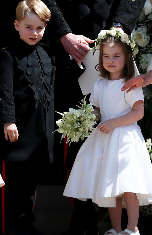 George and Charlotte at the Royal Wedding last year. Picture: Jane Barlow/PA Wire