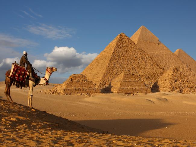 The pyramids are often seen rising from bare, undisturbed stretches of sand. Picture: istock