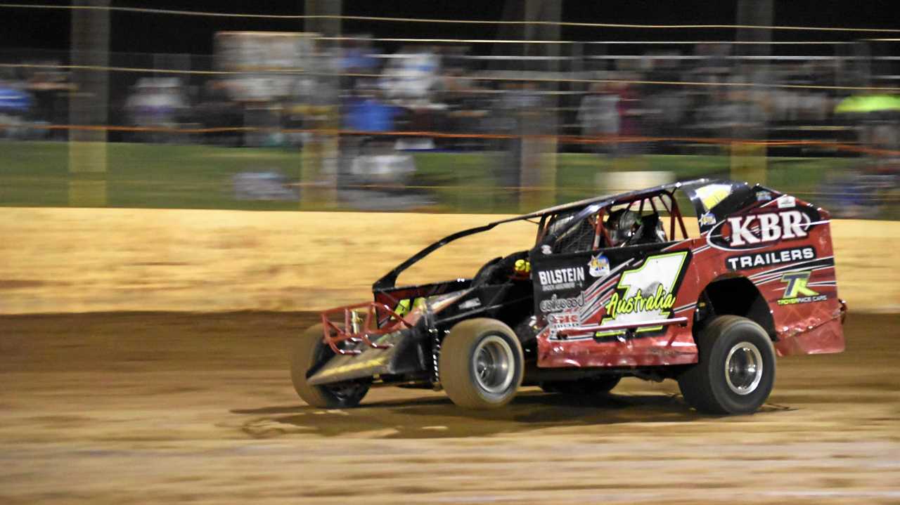 IN CHARGE: Australian champion Kevin Britten leads the field at Kingaroy Speedway earlier this year. Britten is targeting a fourth straight Australian V8 Dirt Modified title when he races at Toowoomba from January 17-19. Picture: MDossRacing Photography.