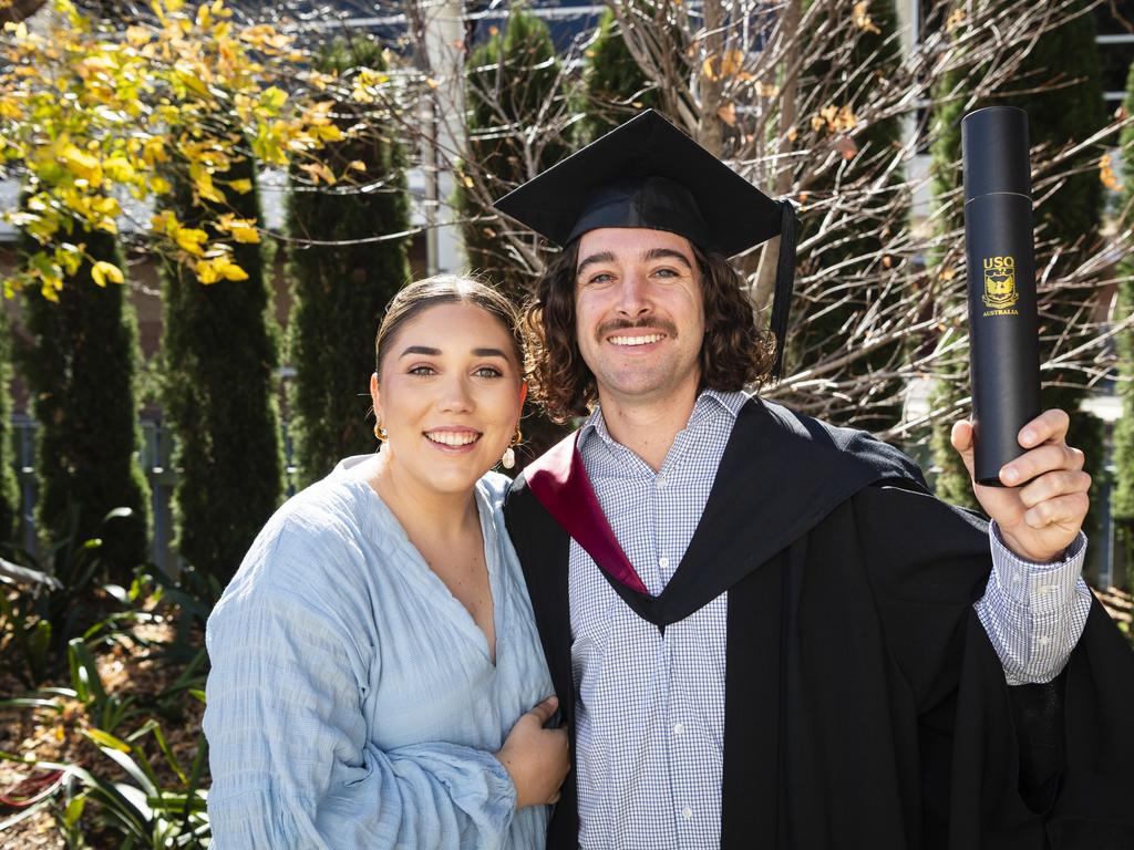 Bachelor of Engineering Science (Mechanical Engineering) graduate Brad Chambers with partner Amy Graham at his UniSQ graduation ceremony at Empire Theatres, Wednesday, June 28, 2023. Picture: Kevin Farmer