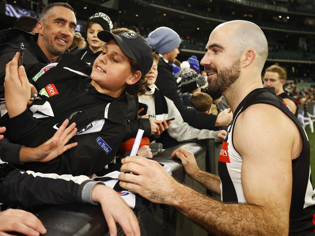 Selfies with Steele after the Pies were victorious. Picture: Getty Images