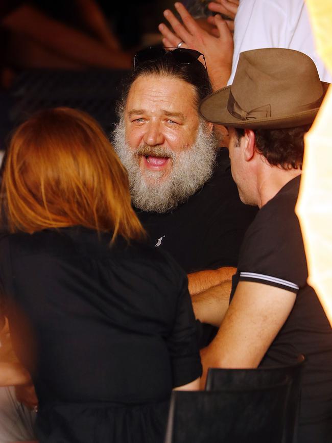 Russell Crowe chats to Sacha Baron Cohen and Isla Fisher. Picture: Sam Ruttyn