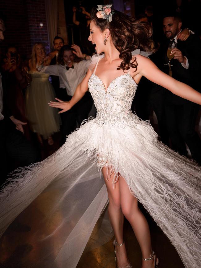 Durante surprised guests by swapping her 18th-century inspired gown for an 'old-hollywood' inspired lace dress for the reception. Photo: Instagram.