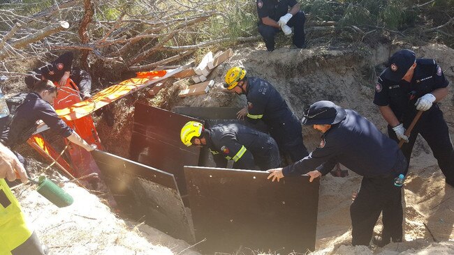 Emergency services had to take extreme caution to remove the man from the sinkhole. Picture: Queensland Police Service