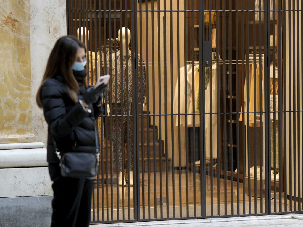 Shops are closed in Galleria Umberto, in downtown Naples, southern Italy. Picture: Alessandro Pone/LaPresse via AP