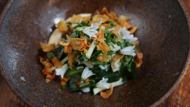 The pretty and elegant spanner crab with wild and fermented garlic. Picture: Rebecca Michael.