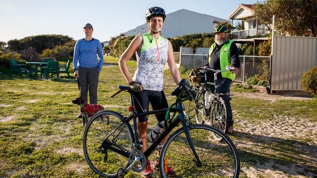 Executive Director of Walking SA, Dr Helen Donovan with her dog Fleckig, cycling youtuber Serafina Tane, and Sam Powrie from Port Adelaide Bicycle User Group. Picture: Matt Turner