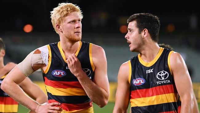 Elliott Himmelberg and Darcy Fogarty after the Collingwood loss. Picture: Mark Brake/Getty