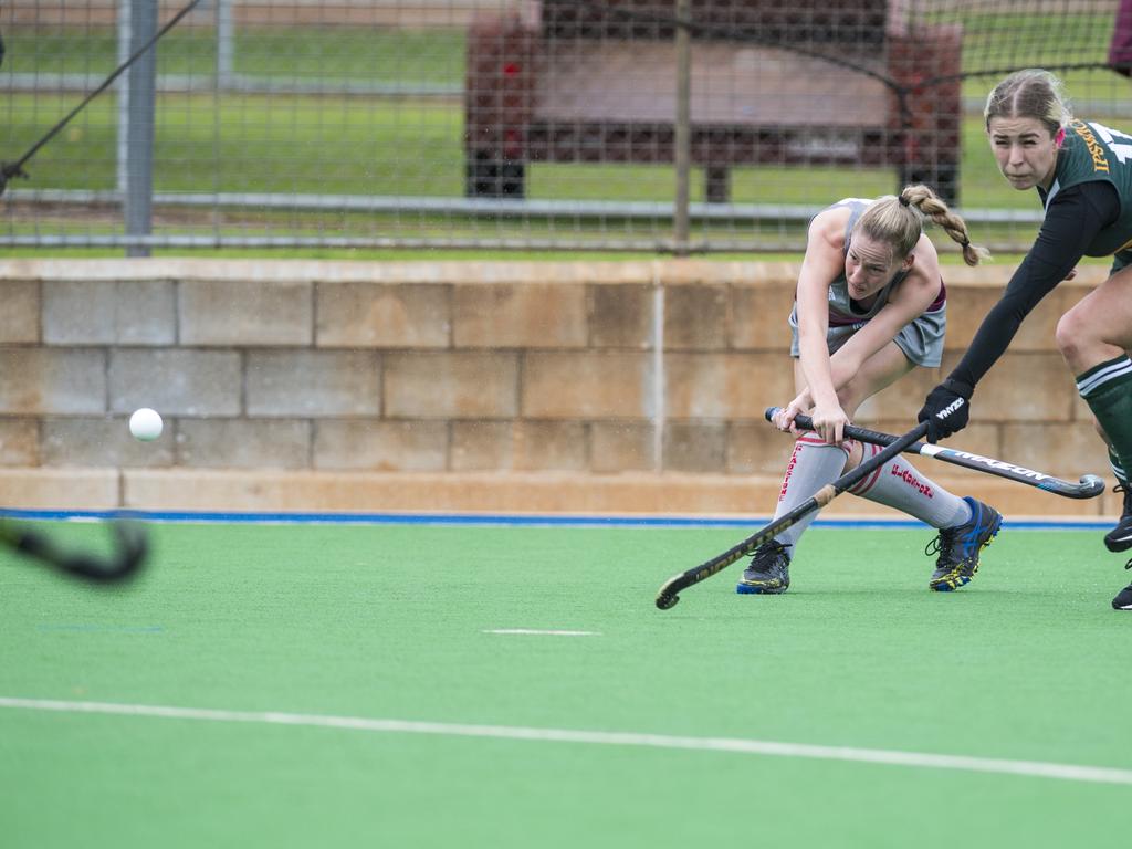 Megan Groves (left) of Gladstone and Gabby Nicholls of Ipswich in Hockey Queensland Championships at Clyde Park, Sunday, May 2, 2021. Picture: Kevin Farmer