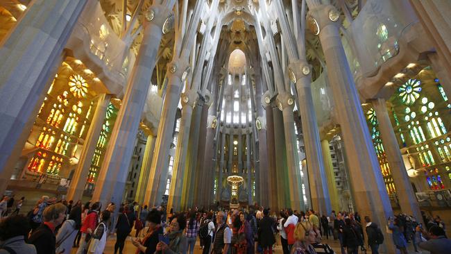 Tourists crowd the Sagrada Familia church in Barcelona, Spain. AP